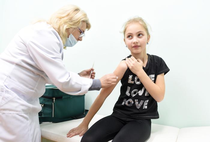 Maryana, 9, from the Lviv region of Ukraine, receiving her measles vaccine during a recent immunization campaign supported by UNICEF.
