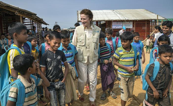 UNICEF Executive Director Henrietta H. Fore visits with Rohingya refugee children outside a learning center in the Kutupalong-Balukhali camp in Cox's Bazar, Bangladesh.