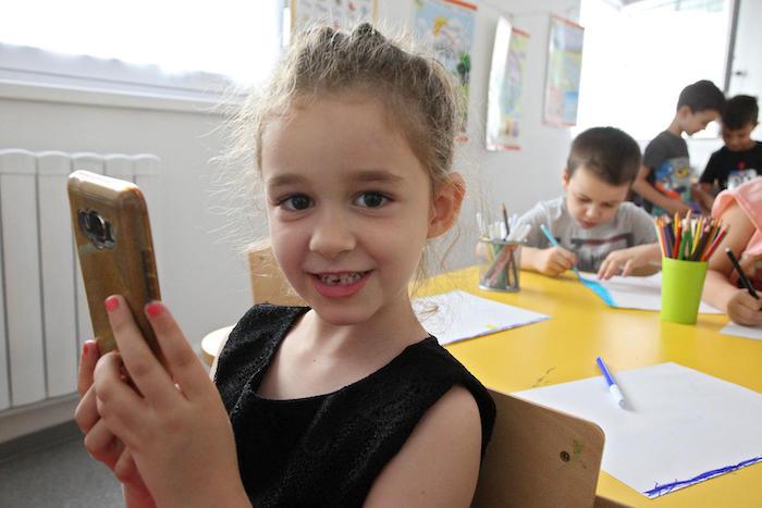 Kids are never too young to learn about online safety. Vasilisa, 6, lives in Serbia, and she and her mother took part in UNICEF-supported workshops held at her preschool to teach the entire family how to stay safe on the internet. © UNICEF/UN0341446/Vas