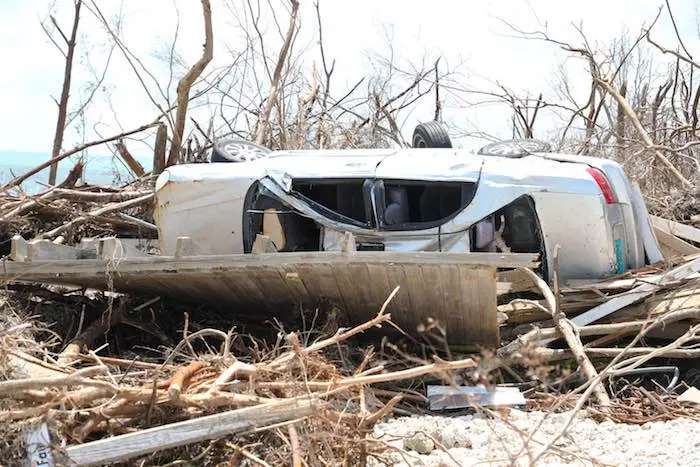On 6 September 2019, a view of Benson Etienne's neighborhood. Benson Etienne, 15, rides his bicycle around the hurricane-hit Marsh Harbour, in Abaco Island. 