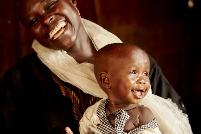 Nine-month-old Amira's mother, Einas Ahmed Harun Mohamed Sajid, is happy now that her baby is thriving after being treated for severe acute malnutrition in Aweil, South Sudan.