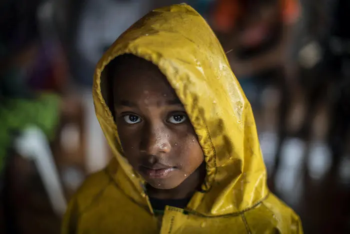 A young girl in Bilwi, Nicaragua heads home from the shelter where her family sought refuge during Hurricane Iota.