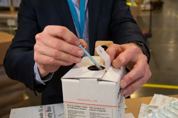 auto-disable syringes and safety boxes that are being used in the Covid-19 response at UNICEF's warehouse in Copenhagen, Denmark © UNICEF/UN0377320/Asamoah