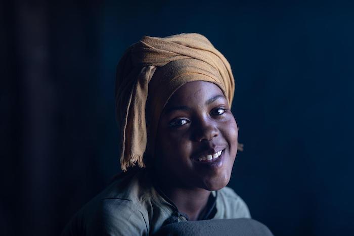 In Ethiopia, girl smiles into the camera 