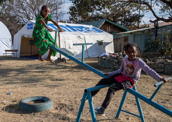 Two of the nearly 500 children who, uprooted by violence in the Tigray region, have come to stay at a primary school in Mekelle Town, now a displacement center supported by UNICEF.