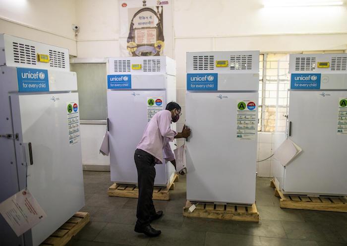 COVID-19 vaccines are stored in ice-lined refrigerators supplied by UNICEF at MMG Hospital in Ghaziabad, Uttar Pradesh, India.