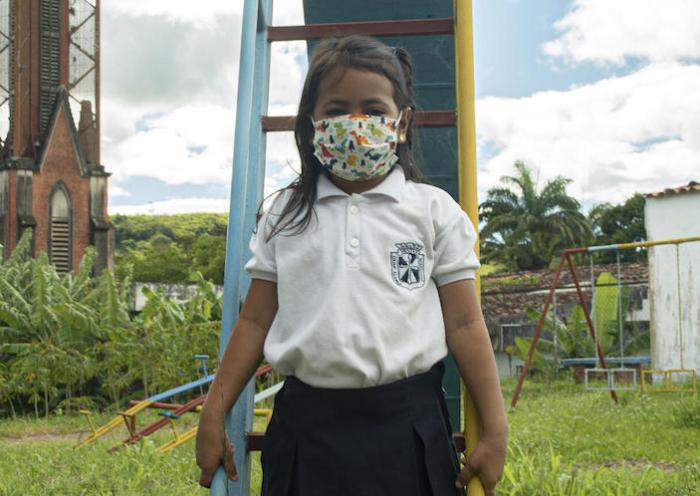  &nbsp;Paola, 6, and her classmates and teachers wear masks at their UNICEF-supported school in Venezuela’s Táchira state.
