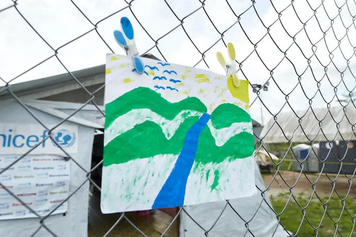 A child's drawing outside the Child Friendly Space UNICEF supports at the migration reception center in Lajas Blancas, Darién, Panama. 