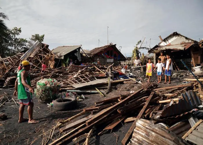 Residents salvage belongings from their destroyed homes in the coastal town of Dulag in Leyte province on December 17, 2021, a day after Super Typhoon Rai hit. Residents salvage belongings from their destroyed homes in the coastal town of Dulag in Leyte province on December 17, 2021, a day after Super Typhoon Rai hit.