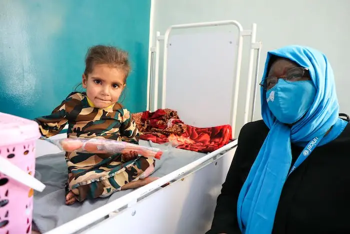 4-year-old Basmina sits in a bed where she is being cared for at the UNICEF-supported SAM IPD at Paktya Regional Hospital. 4-year-old Basmina sits in a bed where she is being cared for at the UNICEF-supported SAM IPD at Paktya Regional Hospital.