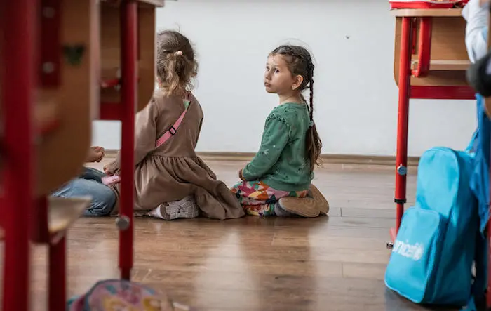 Two of the more than 230 Ukrainian refugee children who have been able to resume their schooling in Bucharest, Romania. Two of the more than 230 Ukrainian refugee children who have been able to resume their schooling in Bucharest, Romania.