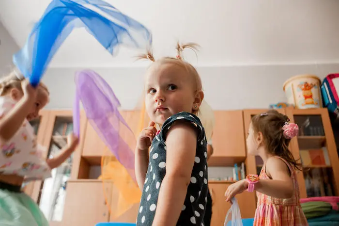 Lilia, 3, joins other refugee children from Ukraine for playtime at a UNICEF-supported daycare center in Rzeszow, Poland. Lilia, 3, joins other refugee children from Ukraine for playtime at a UNICEF-supported daycare center in Rzeszow, Poland.