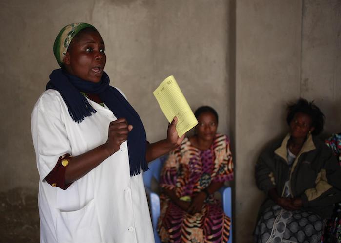 Nurse Rachel Munilis, responsible for prenatal consultations at Bakita Health Center in Lumumbashi, DRC, talks to pregnant women wating for tetanus vaccinations in July 2010. 