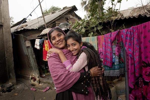 Girls Hugging in Village