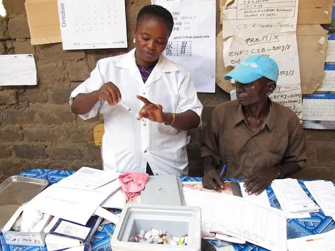 Nurses prepare for the day's vaccination drive at a UNICEF-supported health center in Nyunzu, eastern DRC.
