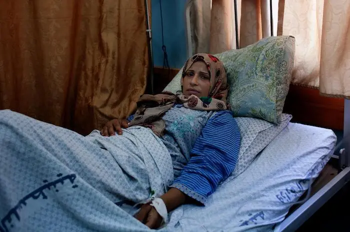 A woman in Pakistan recovers after delivering a full-term stillborn baby girl.