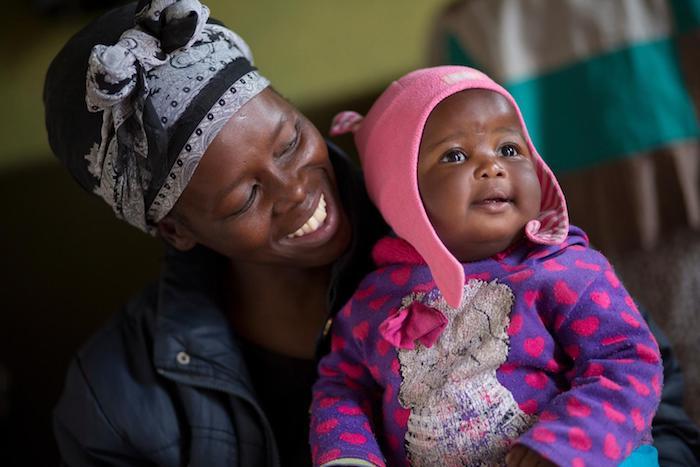 Siphiwe Khumalo, 37, and her newborn baby, Lundiwe, in South Africa in 2014.