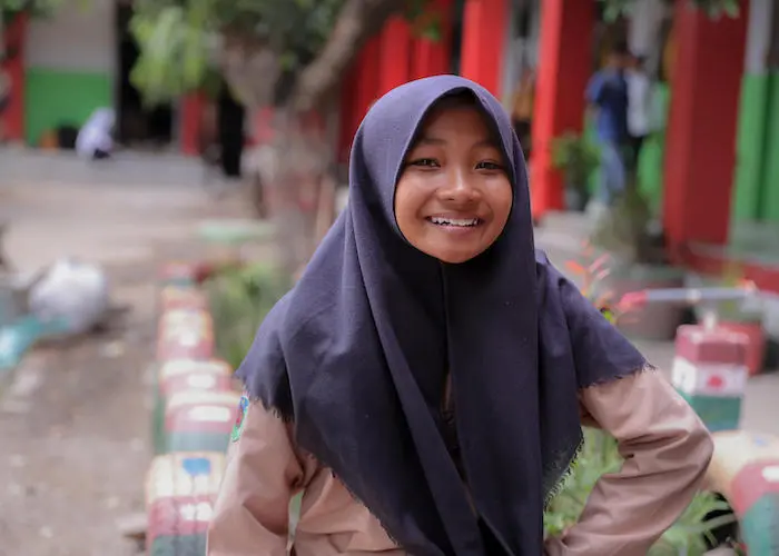 Sophia, 12, and her friends resumed their studies in a UNICEF tent one month after a tsunami struck Palu, Central Sulawesi, Indonesia in September 2018.