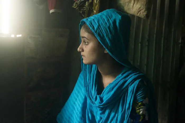 Safia of Dhaka, Bangladesh, used cash assistance from UNICEF to pay for school and to invest in the family business, a tea stall.