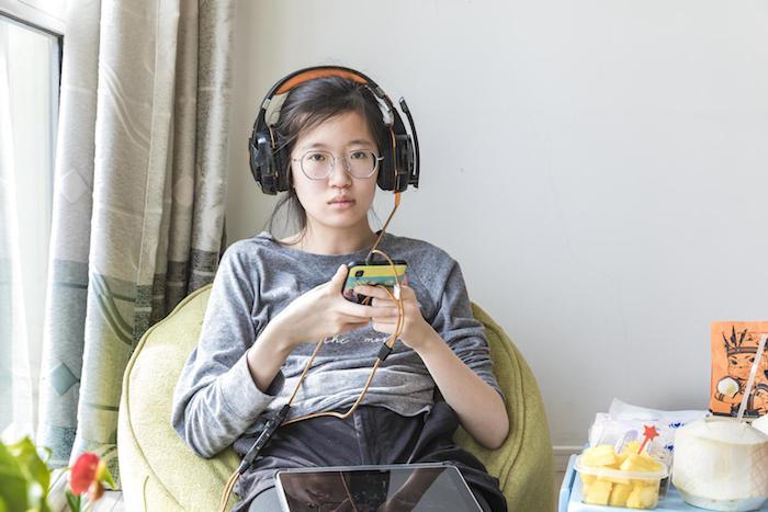 Xiaoyu an 11th grader in Beijing, is one of the hundreds of millions who is learning from home using her digital device and an Internet connection.