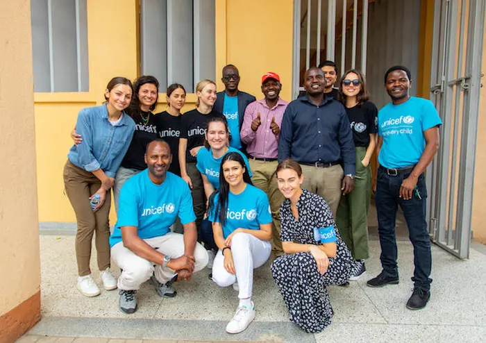 UNICEF USA and UNICEF NextGen meet with Easy and Possible, a local NGO supported by UNICEF Rwanda to deliver Ebola prevention messages via radio in markets and crowded bus parks in Rubavu, Rwanda.