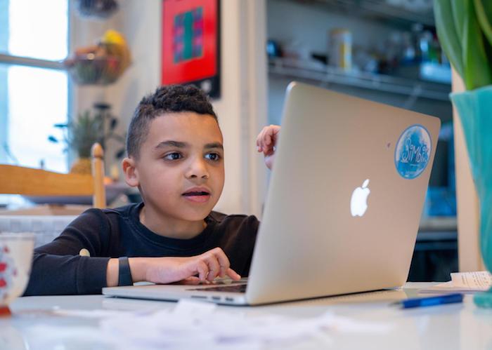 On the morning of 17 March 2020 in Connecticut, United States of America, Luka, 8, completes a reading assignment as part of his second grade class’s distance learning assignments. 