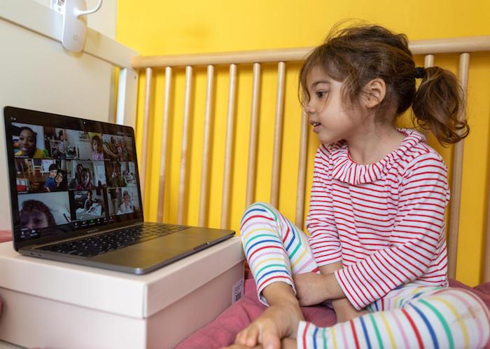 On March 30, 2020, Margot, 4, on a video call with friends from her daycare and their parents, at home in New York City.