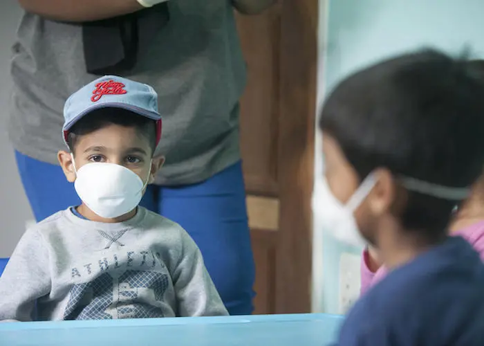 Learners are seen wearing masks at a preschool in Lenasia, Johannesburg, South Africa on March 17, 2020.