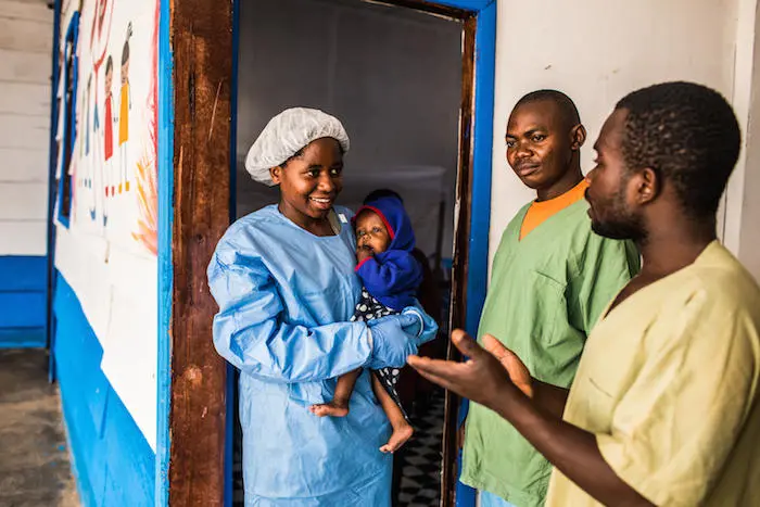 Ruth, an Ebola survivor takes care of young children while their mothers recover from the virus with support from UNICEF. Ruth, an Ebola survivor, takes care of young children while their mothers recover from the virus with support from UNICEF.