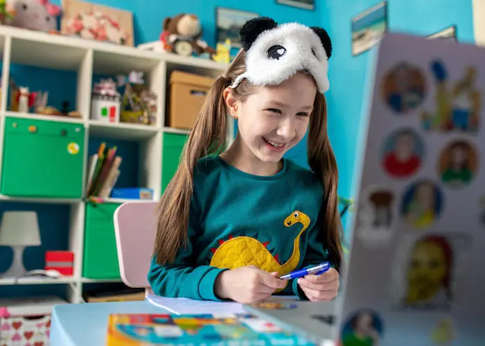 On 15 April 2020 in Kyiv, Ukraine, Zlata, 7, works on schoolwork from home, with all schools in the country closed as part of measures to combat the spread of COVID-19.