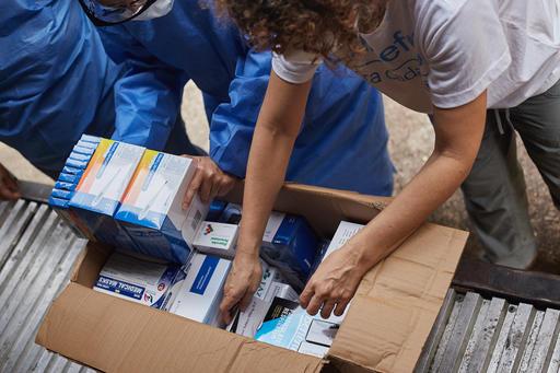 Monica Bucio, chief of UNICEF’s Táchira field office in Venezuela, and health workers at a hospital in Venezuela take stock of medical supplies delivered by UNICEF. Shop UNICEF Inspired Gifts.