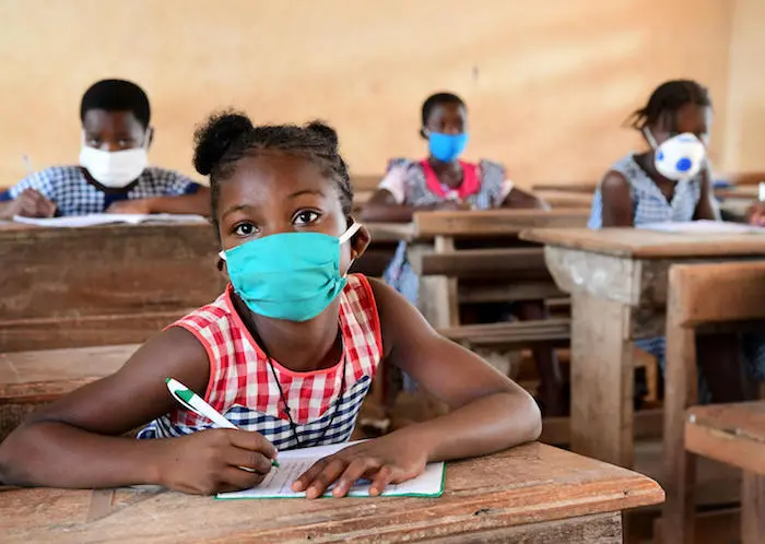 Students attending classes at the UNICEF-supported Primary school of San Pedro, in the South West of Côte d'Ivoire. 