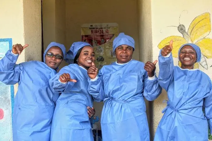Health workers in Democratic Republic of Congo celebrate the end of the most recent Ebola epidemic.