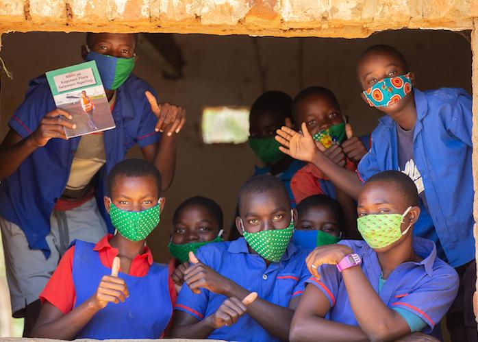 Students seen through a classroom window at Luwambaza primary school in Malawi on September 24, 2020. 
