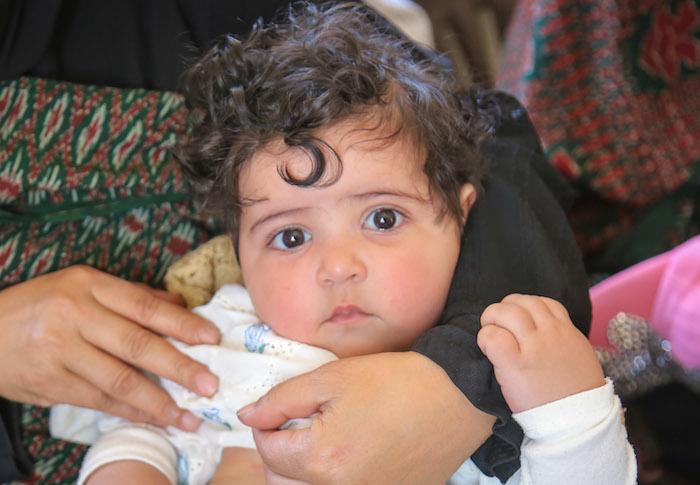 This infant girl is getting better after being treated for pneumonia at a UNICEF-supported health facility in Yemen.