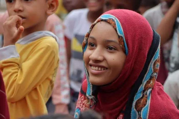 Nora, 11, watches a puppet show at a UNICEF Child-Friendly Space in Aden, Yemen. Nora, 11, watches a puppet show at a UNICEF Child-Friendly Space in Aden, Yemen.