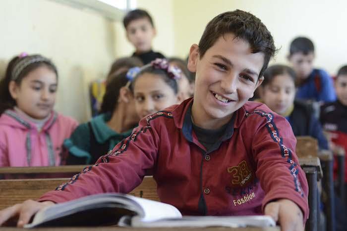 Yousef, 10, got back to learning in a "real" school in 2018 thanks to efforts by UNICEF and partner Educate A Child to rehabilitate damaged classrooms and reopen five schools in Homs.