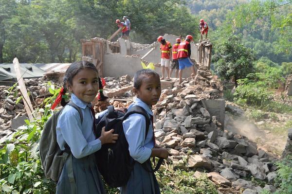 Second-graders Rushma Shrestha and Rakshya Adhikari head back to school in Gorkha.