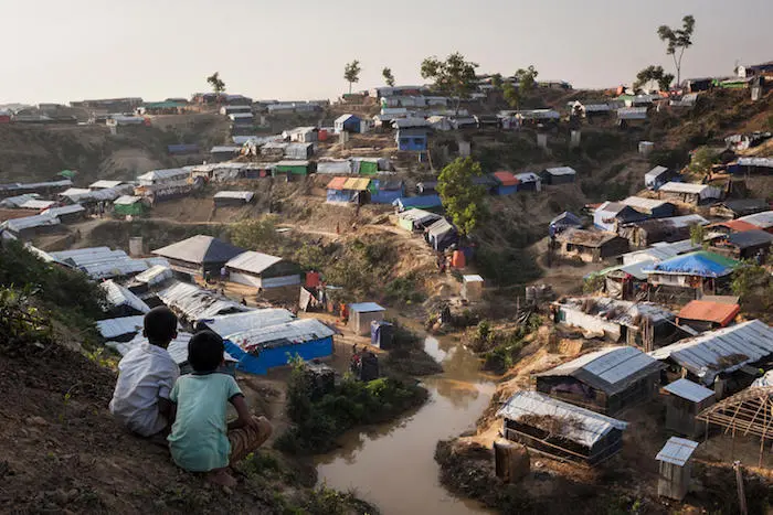 Children look out at shelters in the Balukhali makeshift settlement, Cox's Bazar, Bangladesh, November 2017.