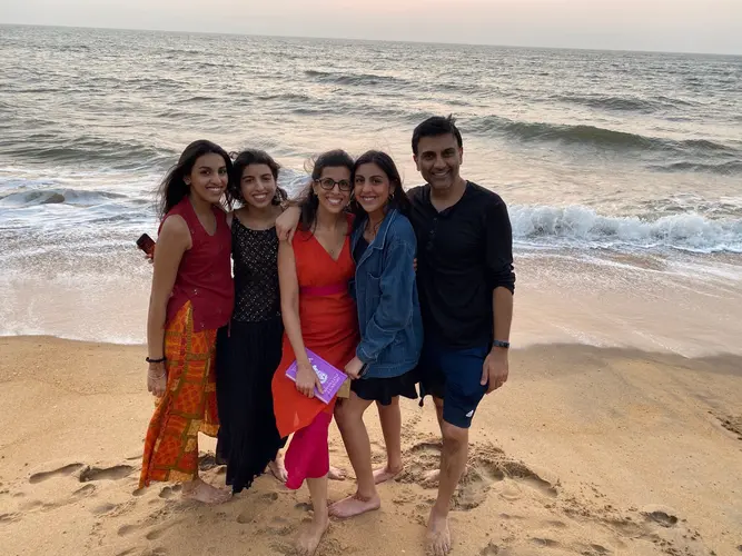 People Posing on a Beach