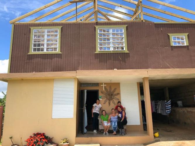 Thanks to a UNICEF USA-supported hurricane recovery program in partnership with New York state, this family's home in Barranquitas, Puerto Rico, will soon have a new roof.