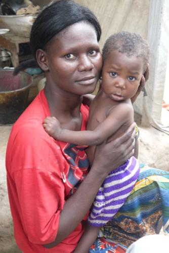 A mother and child just after getting the child&#039;s birth registered in the Central African Republic.
