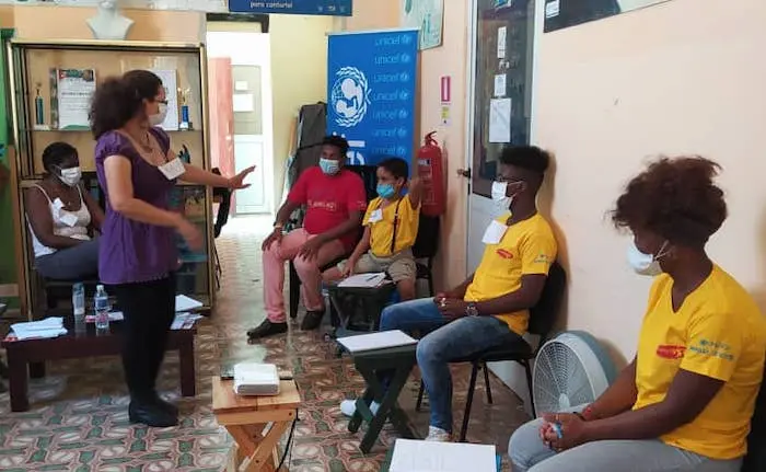 Fantasy and Sci-Fi author Malena Salazar Maciá guides a collaborative storytelling discussion about the future of health with a group of teens at ProSalud youth center in Cuba with support from UNICEF. Fantasy and Sci-Fi author Malena Salazar Maciá guides a collaborative storytelling discussion about the future of health with a group of teens at ProSalud youth center in Cuba with support from UNICEF.