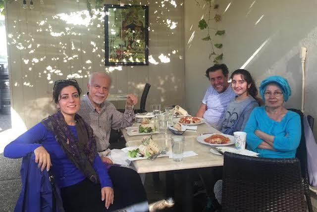Narges Asad with her family.
