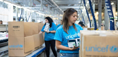 At the UNICEF Global Supply and Logistics Hub in Copenhagen, staff pack medical, nutrition and shelter supplies for delivery to children and families affected by devastating floods in northeastern Libya. 