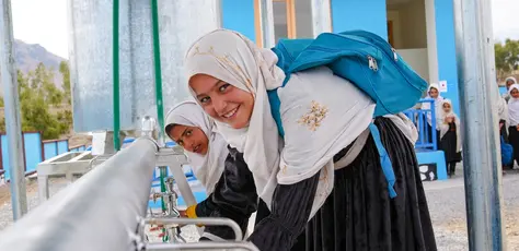 Students wash their hands after using the latrine at Soroubi Girls’ School in Nazyan district, Nangarhar, Afghanistan.