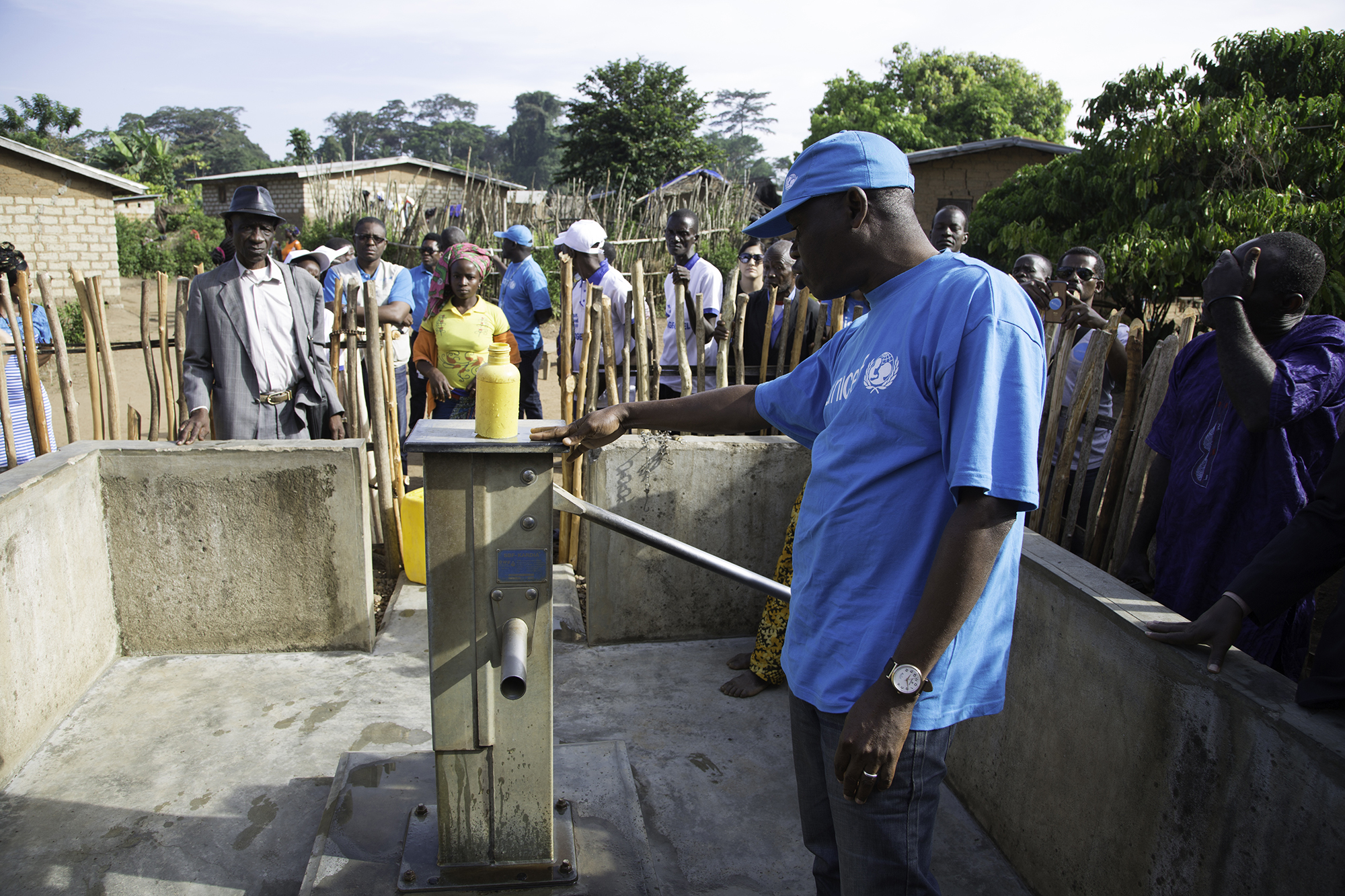 people around a well